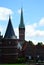 Historical Holsten Gate and Cathedral in Spring in the Old Town of the Hanse City of Luebeck, Schleswig - Holstein