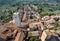 Historical landscape with brick towers and old houses of italian town San Gimignano. UNESCO World Heritage Site
