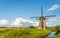 Historical mill in Dutch polder landscape