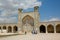 Historical mosque with walking people around