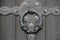 Historical old antique door handle close-up of a castle wooden door background texture