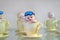 A historical porcelain figurine. porcelain cup little porcelain child with glasses. Ancient formation