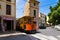 Historical railway with wooden carriages transports visitors to Soller port, Mallorca, Spain.