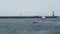 Historical sailing boats and schooner sailing along the Rostock Harbor at Warnemuende during Hanse Sail weekend event