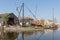 Historical ships at shipyard with slipway in Dutch village Workum