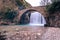 The historical stone arched bridge of Palaiokarya in Trikala