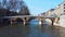 Historical stone bridge on river in old town under clear sky