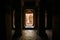 Historical stone pillars of badami inside the temple in the dark.