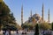 Historical tower and mosque in centre istanbul seashore with boats and tower turkey