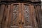 Historical wooden gate of Frauenkirche with rich carving ornaments, Munich, Germany