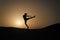 Hit your goal. Silhouette man motion jump in front of sunset sky background. Daily motivation. Healthy lifestyle