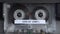 Hits of 1980's Music Compilation, Audio Cassette Tape Rolling in Vintage Player