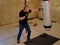 Hitting the Heavy Bag in Home Basement Gym