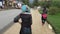 Hmong Minority women walk in a street of Sapa