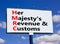 HMRC her majestys revenue and customs symbol. Concept words HMRC her majestys revenue and customs on billboard against blue sky