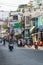 Ho Chi Minh City, Vietnam - 08-06-2019: colorful perspective of Bui Vien Street with numerous hotel, bar and shop sign boards,