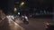 Ho Chi Minh City, Vietnam - August, 2019: cars and motorbikes are driving on road in nighttime