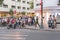 Ho Chi Minh City, Vietnam: a crowd of motorbikes occupies the sidewalk in front of the crosswalk in the presence of a policeman