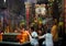 HO CHI MINH CITY, VIETNAM - JANUARY 5. 2015: Buddhist believers light incense sticks in pots in chinese temple. Massive fume in