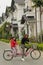Hoa Binh, Viet Nam - December 03,2016: Mother and daughter are racing bicycle on the road