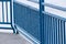 Hoarfrost encrusted blue railing
