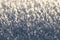 Hoarfrost. White frost. Frost. Small crystals of ice. Winter background. Christmas background. Closeup of hoarfrost. Frozen surfac