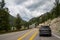 Hoback, Wyoming - June 25, 2020: Traffic jam on the mountain pass due to road construction. Traffic is backed up due to a one-way