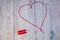 Hobbies and crafts concept, heart of red threads
