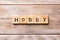 HOBBY word written on wood block. HOBBY text on wooden table for your desing, concept