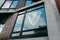 Hoboken, NJ, USA - May 12th 2020 : Sign on a residential building`s window spreading a message of love, solidarity and community