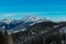 Hochanger - Panoramic view of snow capped mountain peak Hohe Veitsch on the way to mount Hochanger, Muerzsteg Alps