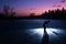 Hockey player silhouette on ice, sport photo