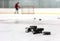 Hockey player with stack of pucks