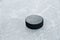 Hockey puck on ice