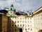 Hofburg palace and snow mountains