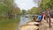 Hogenakkal,Tamilnadu,India-March 19 2022: Tourists enjoying Boating ride in parisal or coracle to view beautiful scenery and