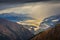 Hohe Tauern mountains and lake from above Grossglockner road at dawn, Austria