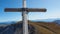 Hohe Weichsel - A wooden cross on top of Hohe Weichsel, Alpine peak in Austria. The cross is leaning, as if it was going to fall