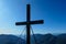 Hohe Weichsel - A wooden cross on top of Hohe Weichsel, Alpine peak in Austria. The cross is supported by 4 metal ropes