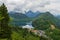 Hohenschwangau castle among green springtime Alpine mountains. Fussen village, Alpsee and Forggensee