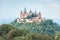 Hohenzollern Castle in summer morning, Germany. It is famous landmark in Stuttgart vicinity. Landscape of Swabian Alps with Gothic