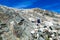 Hoher Sonnblick - An active woman hiking uphill in Hohe Tauern mountain chain in Carinthia, Austria