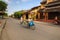 Hoi An, Vietnam - 12 May 2014: A garbage collector and her bicycle, Hoi An Ancient Town