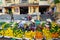 Hoi An, Vietnam - 12 May 2014: Unidentified flower vendors at the Hoi An market in Hoi An Ancient Town