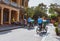 HOI AN, VIETNAM - MARCH 15, 2017: local Vietnam man riding a traditional cycle in Hoi An. Hoi An, a UNESCO World Heritage site