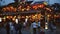 Hoi An, Vietnam - May 10, 2018: Tourists walking along a cozy street with restaurants , decorated with colorful lanterns