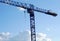 Hoisting construction site crane blue sky lifting equipment building project