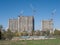 Hoisting tower cranes in construction building process