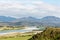 Hokitika river and Southern Alps in New Zealand