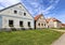 Holasovice houses facades with green lawn